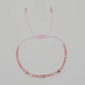 Handgefertigtes Boho-Perlenarmband in Rosa und Gold mit verstellbarer Kordel - Rosa