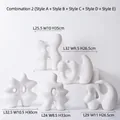 Modern white matte ceramic sculptures set with abstract fluid shapes and hollow design - Artificial Rockery Ornament Set 2