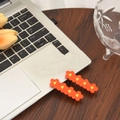 Pince à cheveux orange en acétate avec motif floral élégant et finition brillante - 1 Paire de Barrettes Latérales Oranges