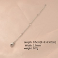 Detail of silver stainless steel extender chain with lobster clasp on pink silk - Steel Color 4 Segments