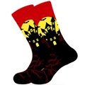 Detail of Halloween socks with bats, full moon and castle patterns on red and black base - Scary Treehouse
