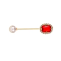 Elegant gold safety pin brooch featuring a red ruby gemstone and a white round pearl - Red