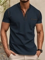 Marineblaues Herren-Polohemd mit braunem Kragen und Brusttasche im sportlichen Stil - S / Marineblau