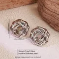 Macro shot of 2.26cm silver woven texture stainless steel stud earrings with size details - Woven Round Shape