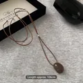 Minimalist wax cord oval pendant necklace in dark brown with 106cm adjustable strap - Coffee