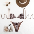 Flat lay of leopard print bikini set with straw hat and sunglasses for beach vacation - S / Leopard Print