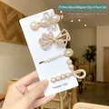 Set di 4 fermagli per capelli dorati con perle e fiocchi di strass su carta - 5# Set da 4 Pezzi Forcina a Fiocco