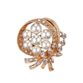 Elegant gold flower brooch with pearls, sparkling rhinestones, and a delicate bow detail - Gold Floral Pearl
