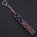 Detail of purple hand-woven lipstick holder keychain with heart-shaped silver metal clasp - Purple