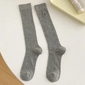 Grey ribbed knee-high socks with delicate black bow embroidery and minimalist design - One Size / Light Gray