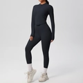 Detail of black high-waist yoga leggings and zip-up jacket with thumbhole cuffs - S / Black