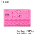 Pink silicone nautical mold for fondant featuring anchor rudder and sailboat shapes - Pink