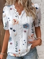 Close-up of V-neck lace patchwork and floral print on white summer blouse for women - S / White with Grey Floral