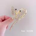 Pince à cheveux papillon dorée avec strass et accents noirs taille 10,5 cm - Papillon Plein Strass