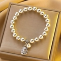Silver bead bracelet with vintage Maneki Neko lucky cat and bell charms in a gold box - Silver Lucky Cat Bell Bracelet (X753)