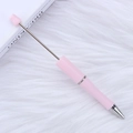 Macaron pink DIY beaded ballpoint pen with metallic silver tip on white plush fabric - Candy Light Pink