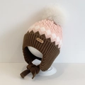 Pink and brown wavy knit earflap hat with large white pom pom and chin ties - Rhombus Twist / Pink Khaki