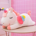 Plush white unicorn toy with pink mane and rainbow wings in a lying position - 52cm (0.42kg) / White