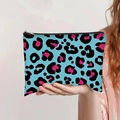 Detail of blue leopard print canvas pouch featuring black zipper and flat rectangular design - Sky Blue Pink Black Leopard Style (jiayingpbb0145)