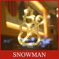 Festive snowman shaped LED window light with warm yellow glow and 21.5cm height - Snowman