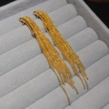 Macro view of gold-plated tassel earrings with delicate beaded chains on velvet - Gold (Real Gold Plated Silver Pin) / Gold