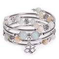 Detail of multi-layer beaded bracelet with silver metal tubes and clover charm pendant - Amazonite