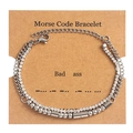 Detail of double-layer Morse code bracelet with crystals and silver-tone beads on card - Bad Ass Silver