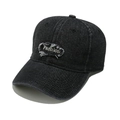 Detailed view of white Fashion embroidery and distressed texture on washed denim baseball cap - Black