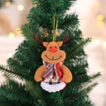 Plush Christmas reindeer ornament with plaid scarf hanging on a decorated tree - Grid Cloth Khaki Deer