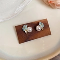 Close-up of light blue flower pearl earrings with gold plating and zircon inlay - Silver Earring Post-Blue