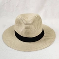 Classic wide brim straw sun hat in beige with black ribbon on white textured background - M (56-58cm) / Beige