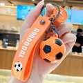 Lebhafter orangefarbener Fußball-Schlüsselanhänger mit GOOOOAL-Band und Sportanhänger - Orange