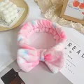 Plush tie-dye pink and blue headband with a large bow for skincare and makeup - Pink Blue Tie-Dye