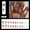 French tip press-on nails in nude pink glitter with black hearts and Love script W923 - W923 White French