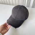 Close-up of distressed brim details on a washed grey vintage cotton baseball cap - M(56-58cm) / Black
