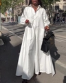 Detail of elegant white long-sleeve loose shirt dress featuring a split hem for women - S / White