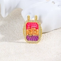 Close-up of golden tarot pendant with colorful enamel and Love is the Answer text - Purple Orange Gradient Love Style (ZYN-DMK873G-2)