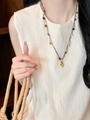 Detailed shot of handmade woven necklace with colorful beads and golden pony pendant - 16# Necklace Gold Multi-color Beads