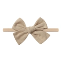 Elastic beige fabric headband for babies featuring a large decorative bow - Solid Beige (6)