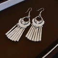 Vintage silver hollow teardrop tassel drop earrings with bohemian metallic design - Silver