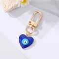 Blauer Evil Eye Herz Schlüsselanhänger mit goldenem Verschluss und Emaille-Finish - Emaille Herz Blaues Auge