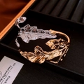 Artistic two-tone leaf bangle in gold and silver finish with realistic vein texture - Gold Silver Two-Tone Leaf Bangle