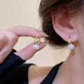 Elegant gold hoop earrings with white round pearl pendants for a minimalist look - E5795 Gold Pearl Ear Hook