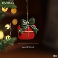 Weihnachtsgeschenk-Baumschmuck aus rotem und grünem Harz mit goldener Schleife - Geschenktüten Stil