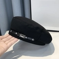 Detail of black cotton baker boy hat featuring leather strap and silver metal buckle - M (56-58cm) / Black