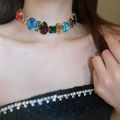 Close-up of multicolor rhinestone necklace with teardrop and square crystals on neck - Multicolor Necklace