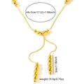 Detail view of gold bead necklace showing 49cm chain length and 3cm fringe pendant - Multiple Beads Tassel / Gold