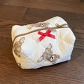 Quilted cosmetic bag in beige with brown teddy bear print and red bow detail - Bear with Bowknot