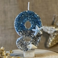 Ocean themed number 9 birthday candle with blue silver gradient glitter and shells - Number 9