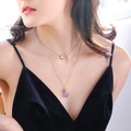Double-layered golden necklace featuring a purple natural crystal pendant on a black dress - NZ378-Gold Purple Natural Stone